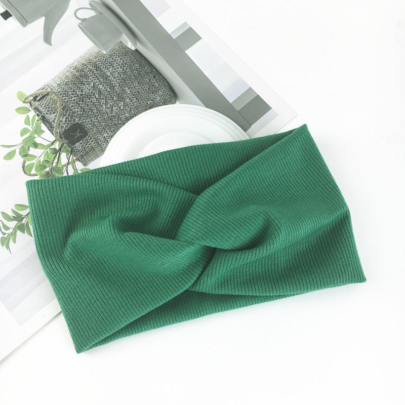 Wide side stretch knitted headband