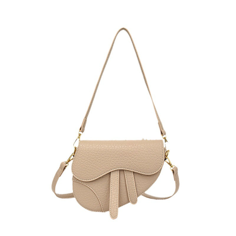 Enkel skuldertaske til kvinder i saddelstil (crossbody)