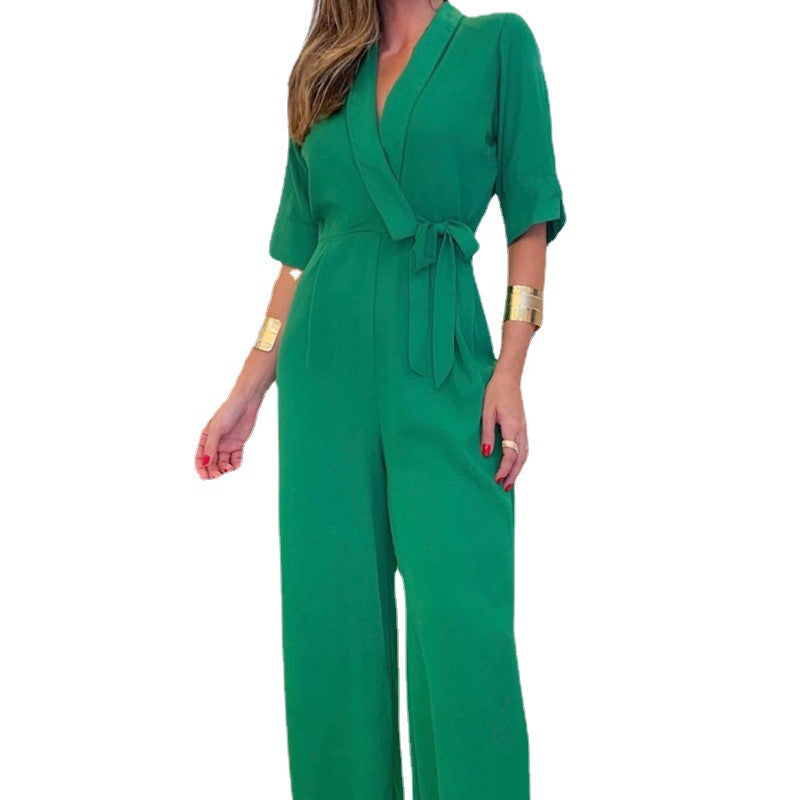 Grøn slå om-jumpsuit til kvinder med revers og middelærmer