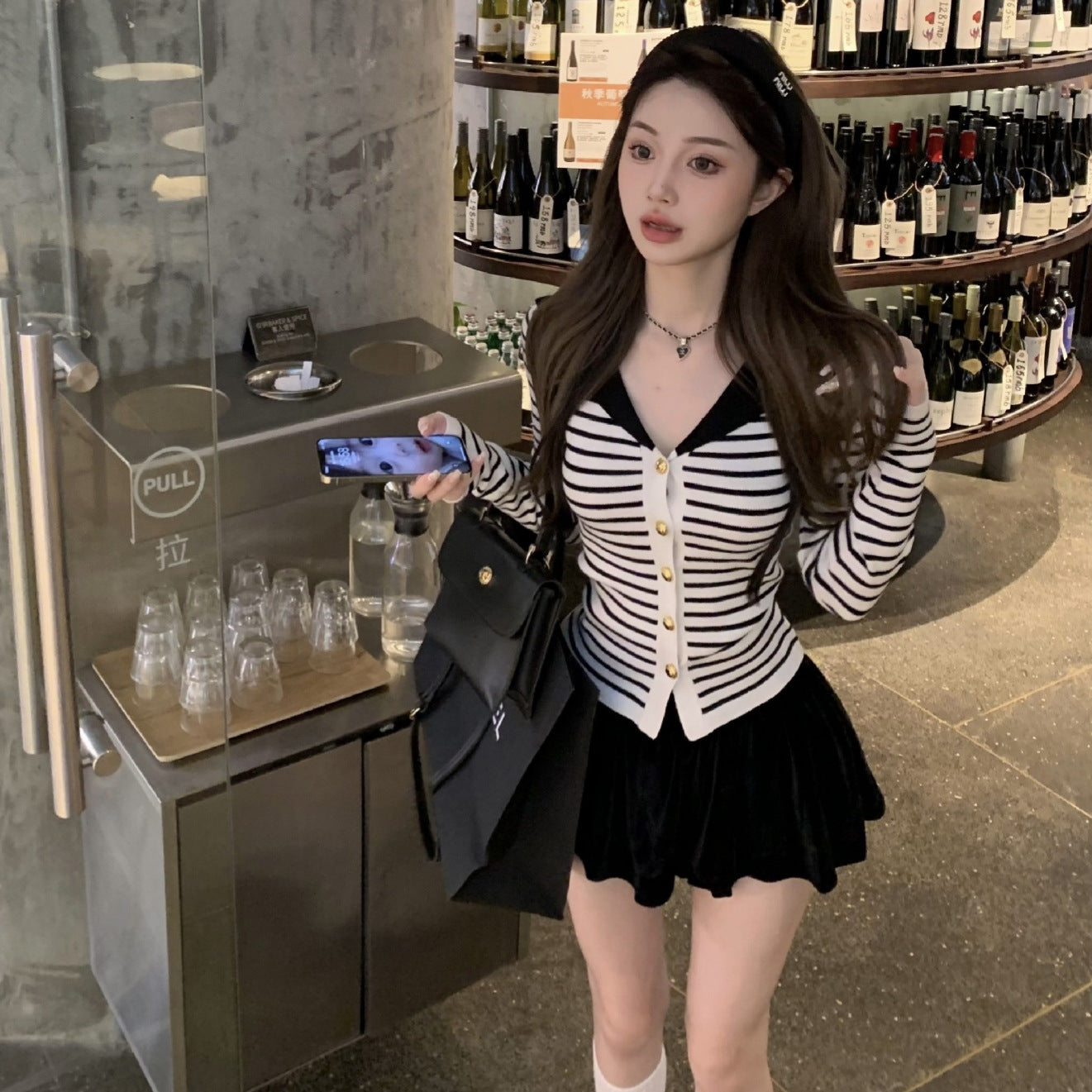 Black And White Striped Knit Top With A Naval-style Collar Designed For A Slim Fit