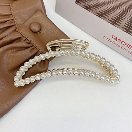 Large pearl hairpins on Instagram