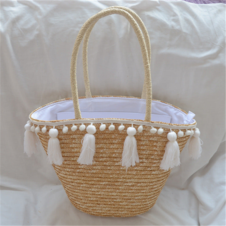 Female hand-woven tassel shoulder bag