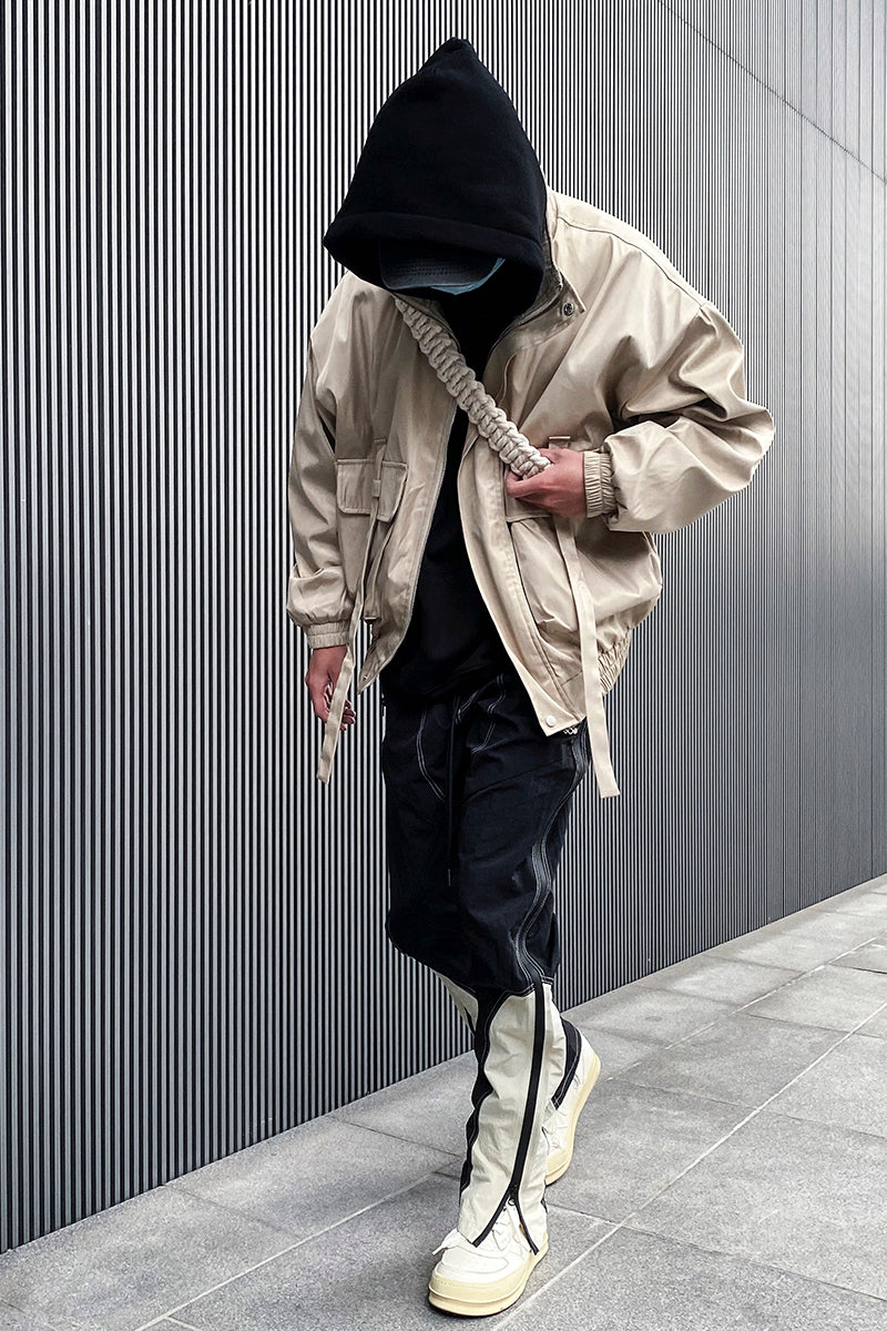 Nylon trenchcoat med store lommer og stropper