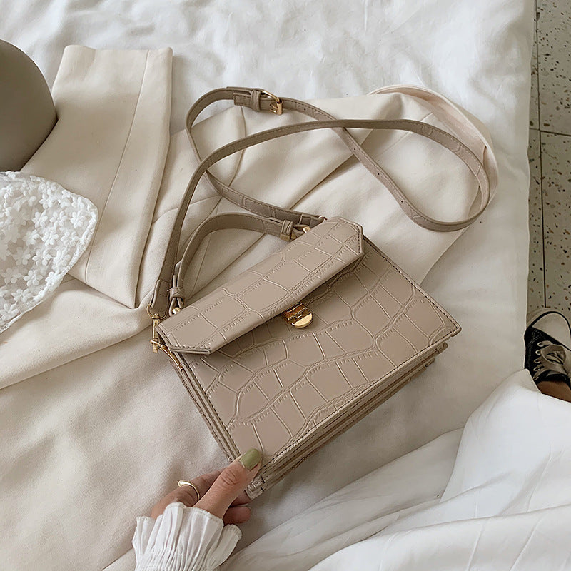 Stone embossed crossbody bag