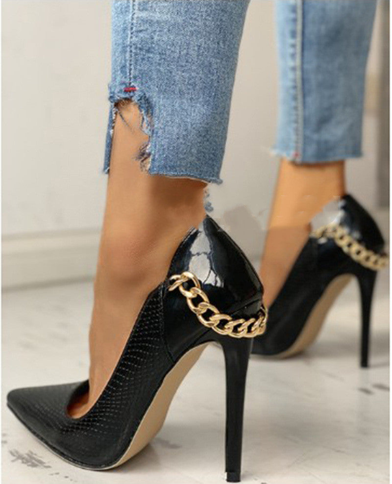 Pointed toe slip-on high heels with metal decoration