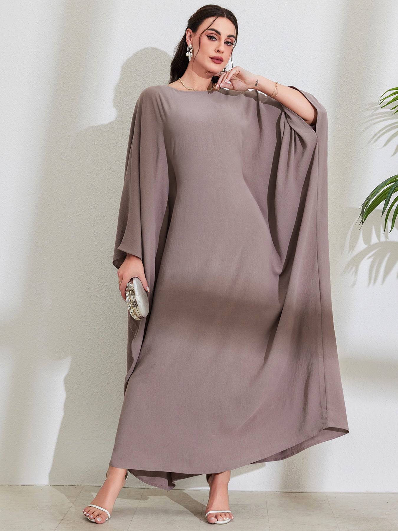 Long Dress With Tie Details Batwing Sleeves And A Round Necklinestylish And Elegant
