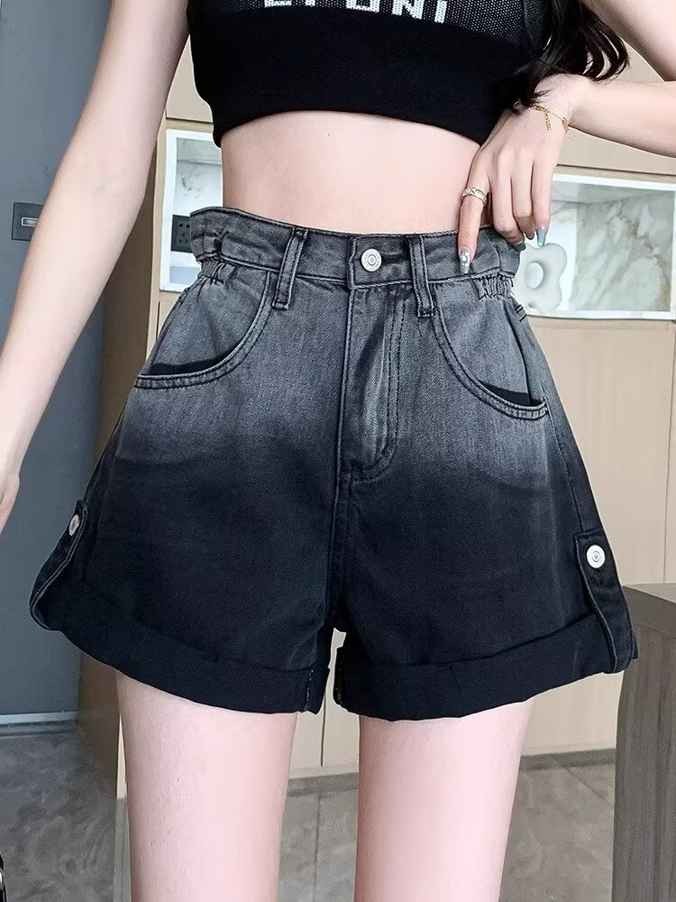 Højtaljede slankende denimshorts med farveforløb og oprullede kanter