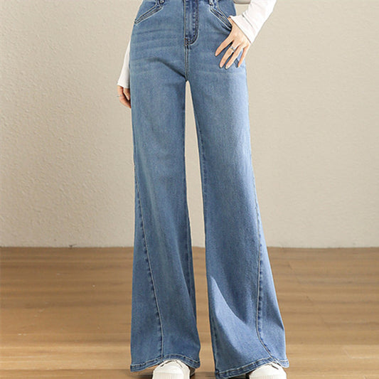 Damehøjtaljede kunstneriske amerikanske letudsvajede jeans