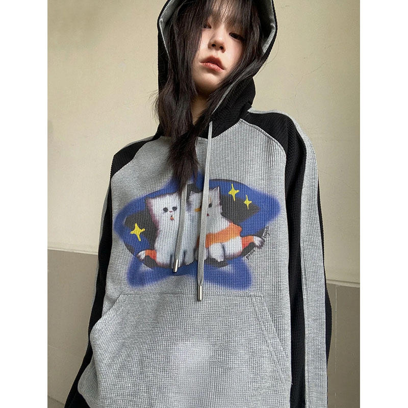 Kvinders løse amerikanske retrostjernekatte-sweater