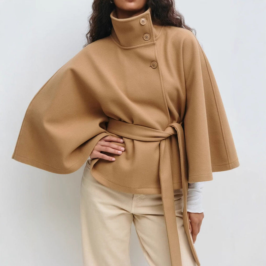 Trench Coat With A Stand-up Collar Buttons And A Belt