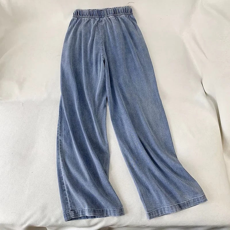 Damebukser i denim med snøre og brede ben