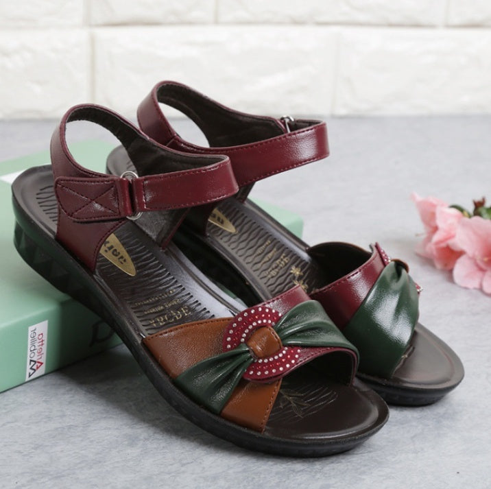 Middle-aged flat female summer sandals