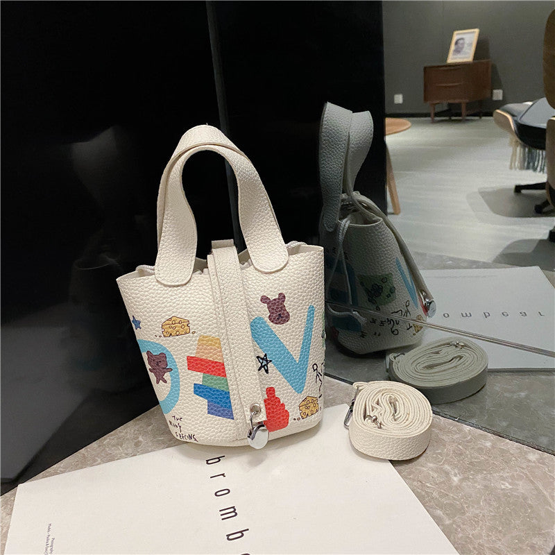 Female cartoon doodle diagonal bag