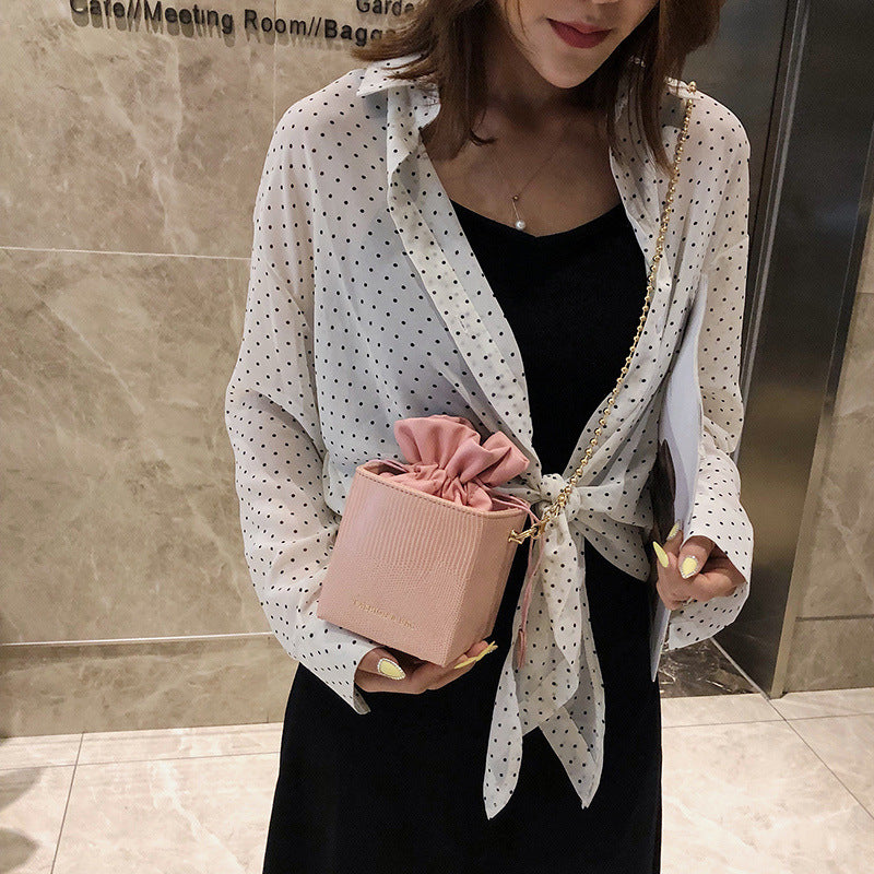Chain drawstring crossbody bag