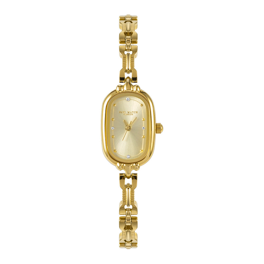 Retro Mid-centurystyle Gold Bracelet Watch With A Niche Design-forward Aesthetic