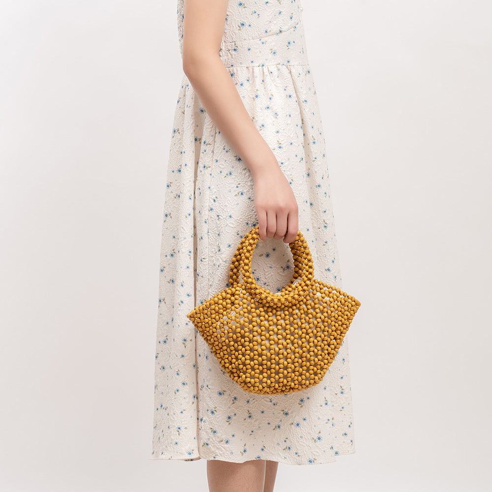 Hand-woven Seaside Beach Vacation Hollow Handbag With Wooden Beads Decoration