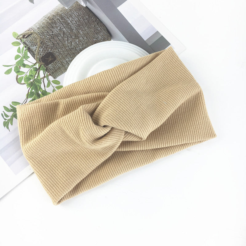 Wide side stretch knitted headband