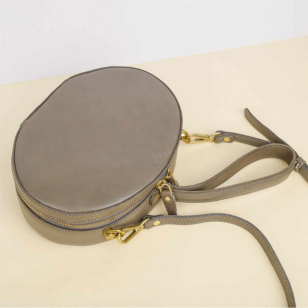 First Layer Cowhide Women's Crossbody Bag Simple Round Hand Carrying Retro