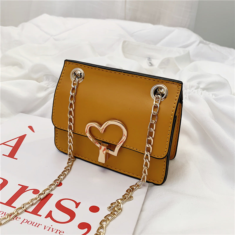 Children's Solid-color Shoulder Bag Fashion Love Hardware Decoration