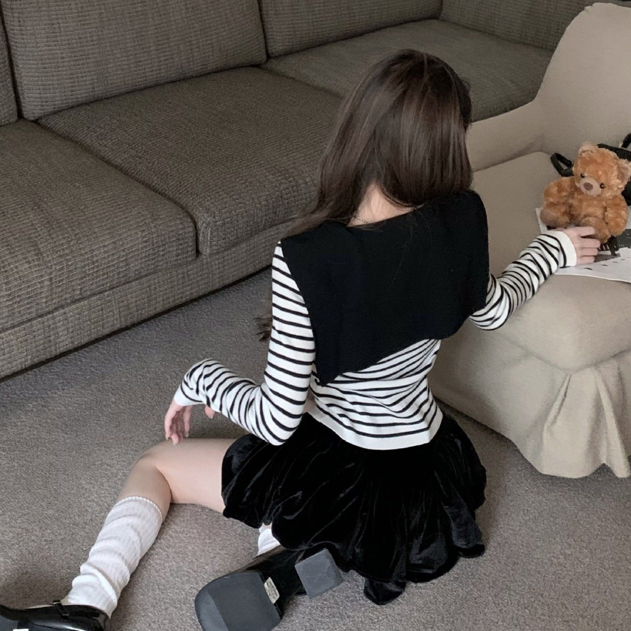 Black And White Striped Knit Top With A Naval-style Collar Designed For A Slim Fit