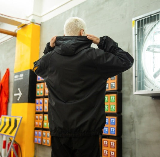 Hooded windbreaker jacket multi-bag tooling