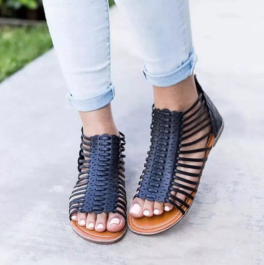 Openwork Roman sandals with flat sole