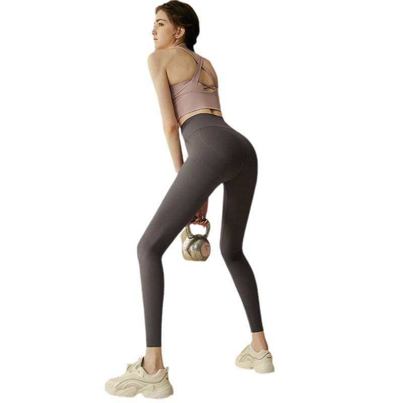 Womens High-Waisted Butt-Lifting Yoga Pants With A Crossed Waist Design For A Bare-Leg Look