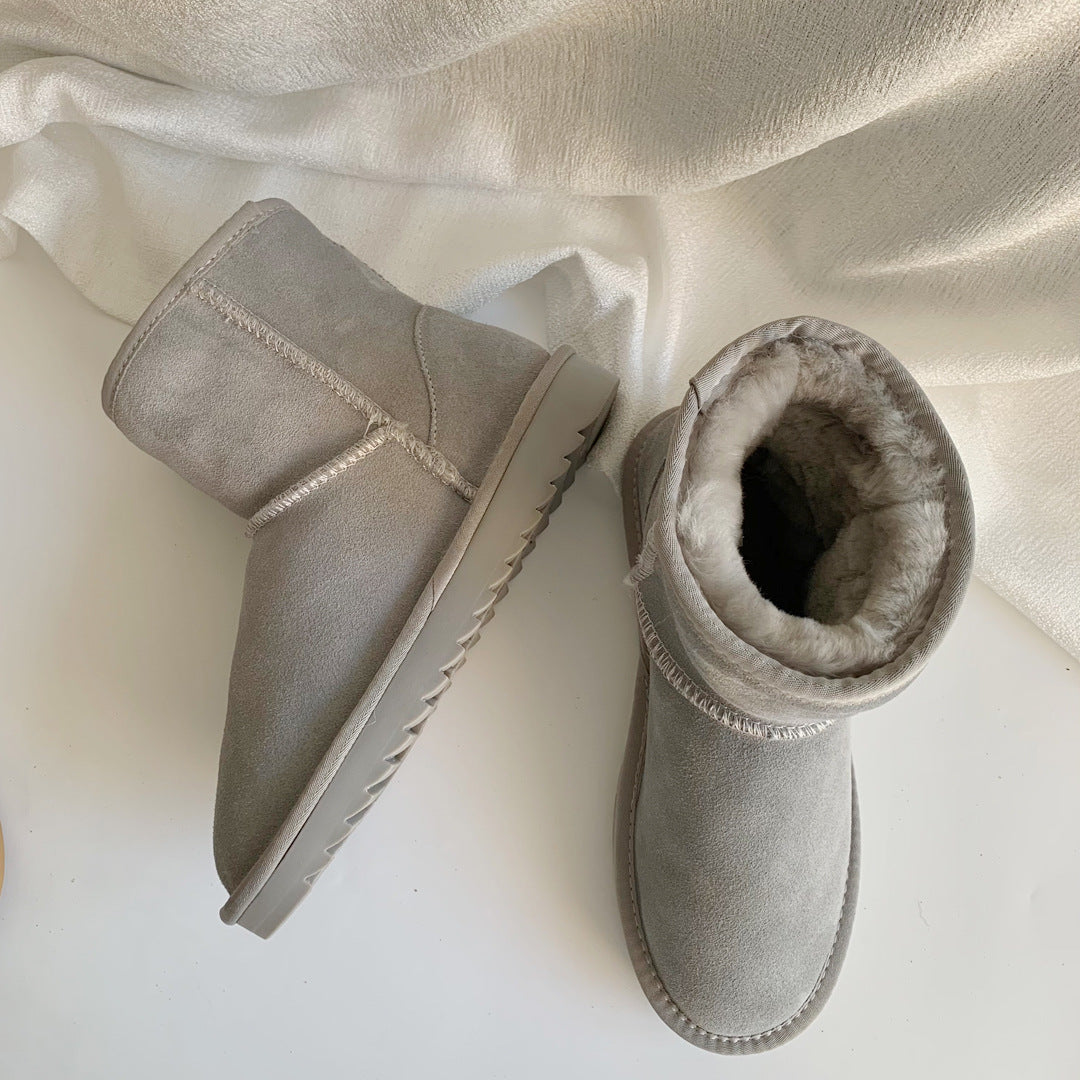 Sneakers i læder til kvinder med kort fleecefor og plateausål