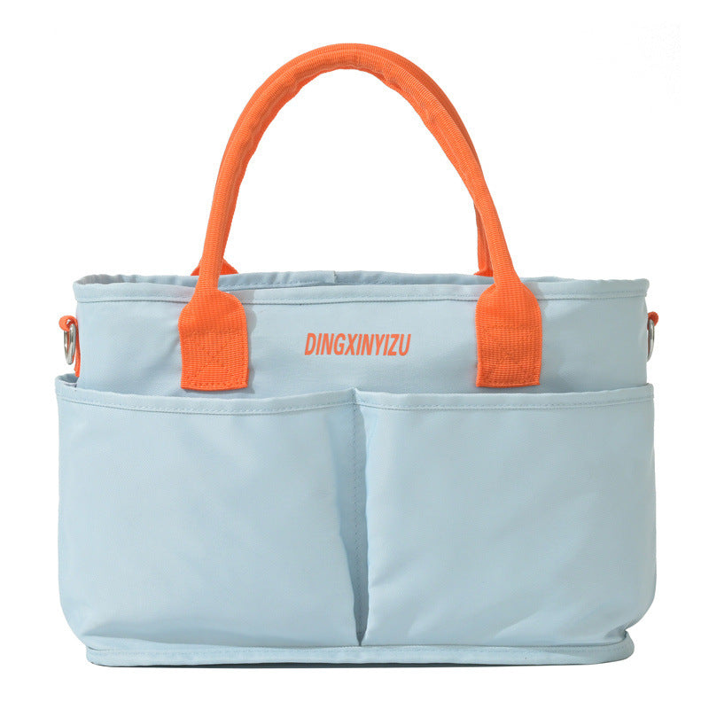 Mommy's Maternity Bag Can Be Attached To A Stroller