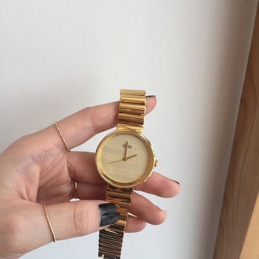 Golden vintage small gold watch