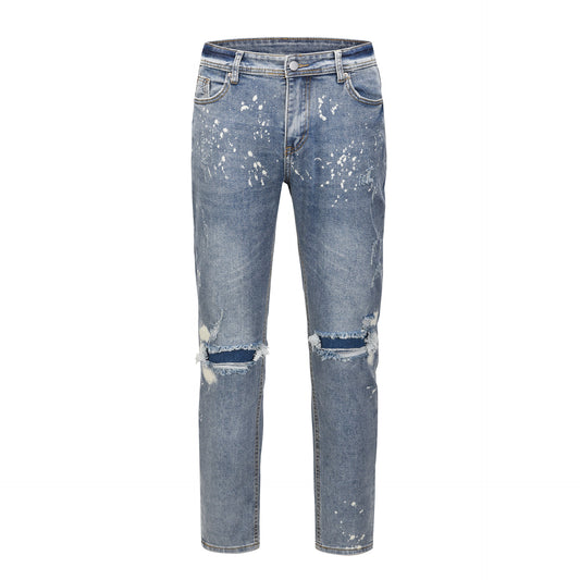 Light Blue Jeans With Splashed Ink And Ripped Elastic Wash