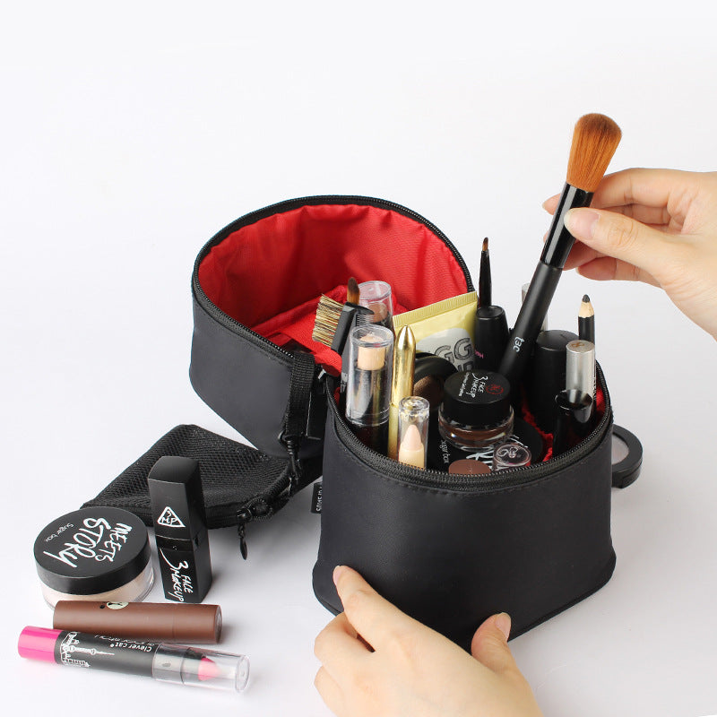 Three-dimensional waterproof portable cosmetic bag
