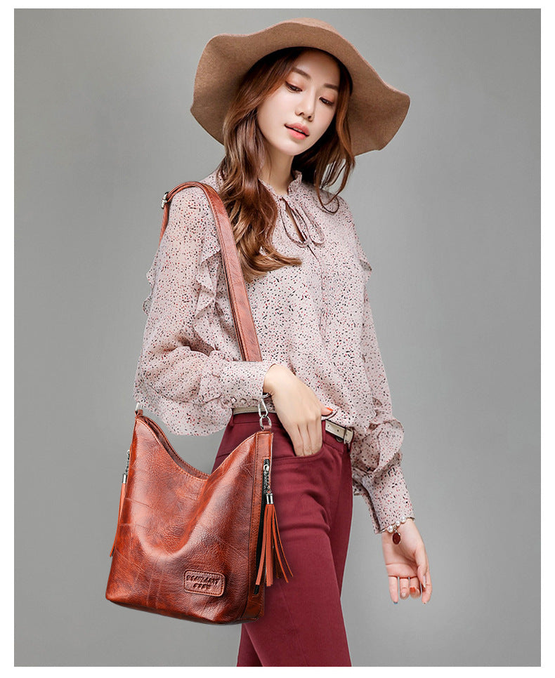 Simple fashion tassel female bag