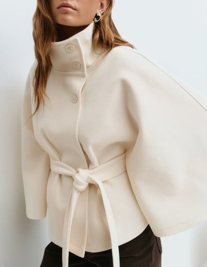 Trench Coat With A Stand-up Collar Buttons And A Belt