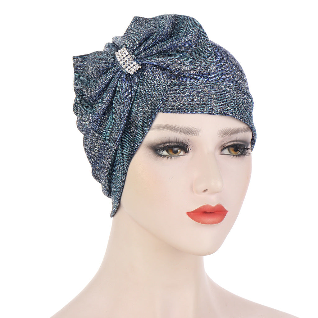 Headband Hat With A Large Cross Bow On The Forehead