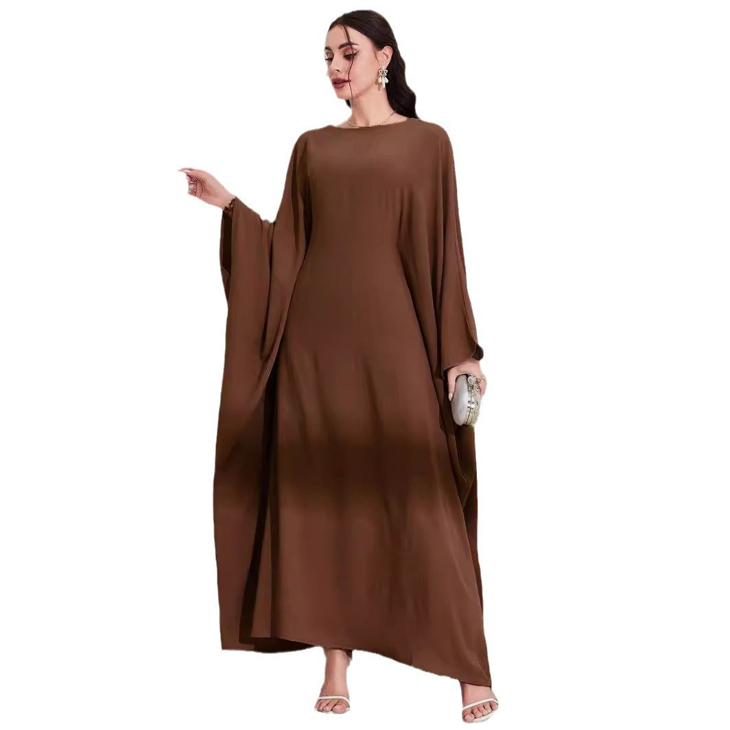 Long Dress With Tie Details Batwing Sleeves And A Round Necklinestylish And Elegant