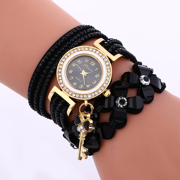 wish AliExpress foreign trade hot sale Women's winding watch alloy diamond four flowers Korean velvet bracelet watch
