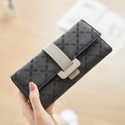 Three-fold wallet with belt buckle