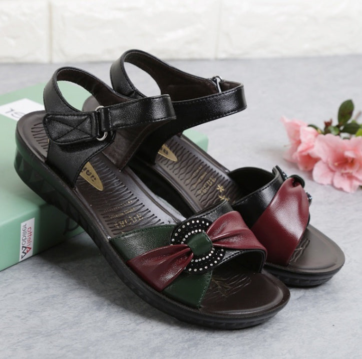 Middle-aged flat female summer sandals