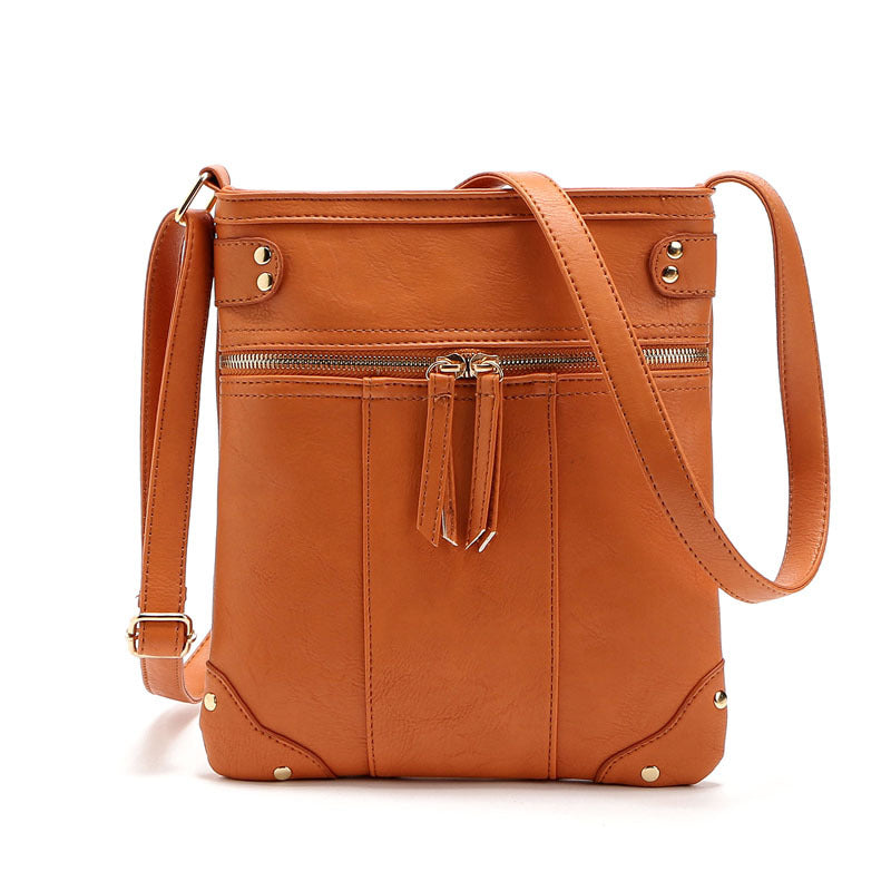 new European fashion handbag bag Crossbody Bag rivets front pocket zipper copper single shoulder bag
