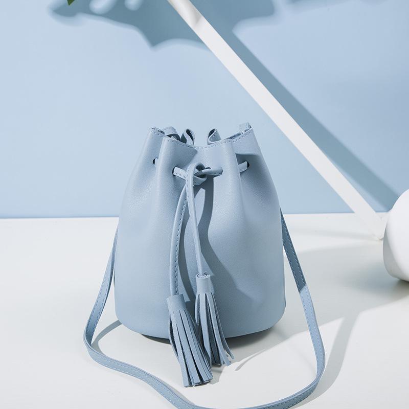 Women's fashion match color consistent wine rubber rope bucket bag