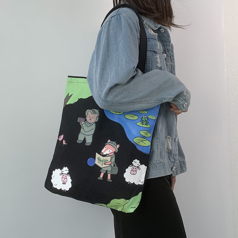 College Students Holding A Stuffed Cloth Bag