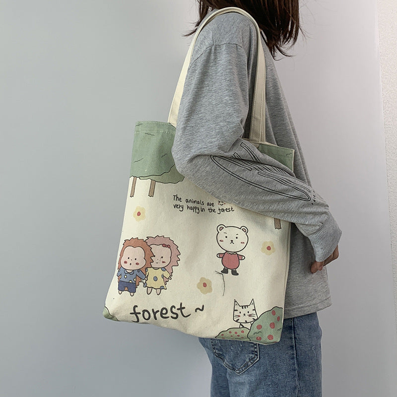 College Students Holding A Stuffed Cloth Bag