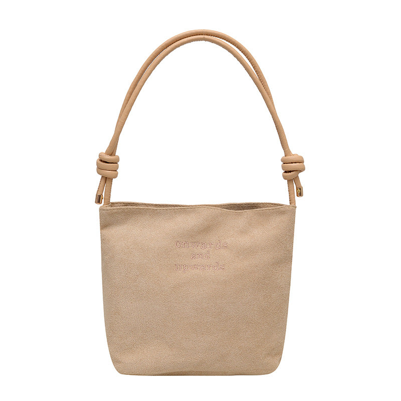 Ny skuldertaske i vintage ruskind til kvinder – en supertrendy must-have bucket-taske