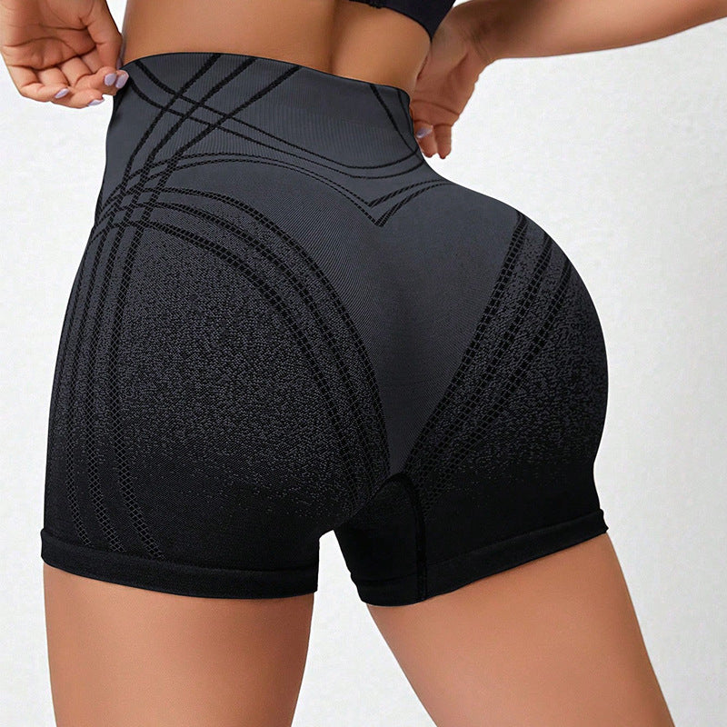 Sports- og fitnessshorts til kvinder med farveforløb