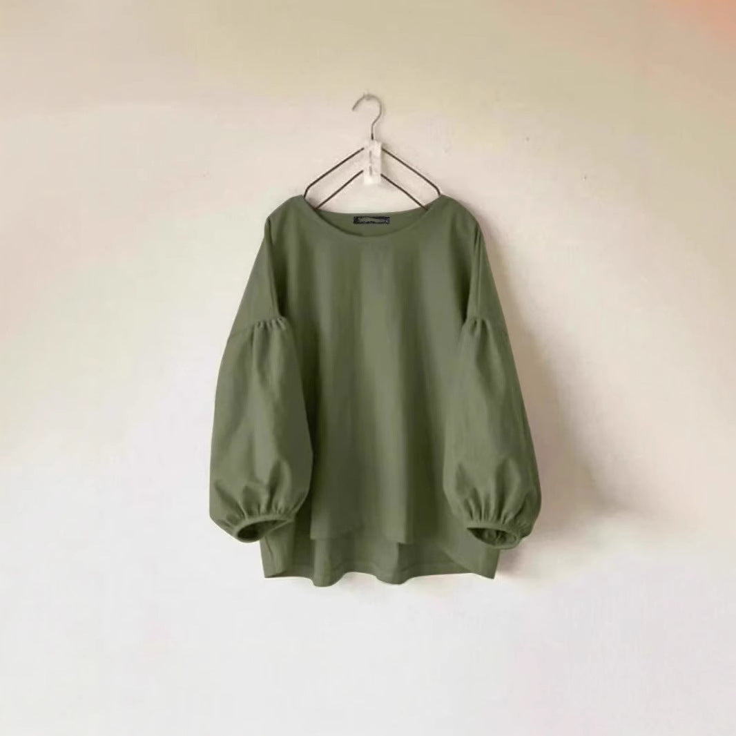 Løstsiddende vintage T-shirt til kvinder med rund hals og pufærmer