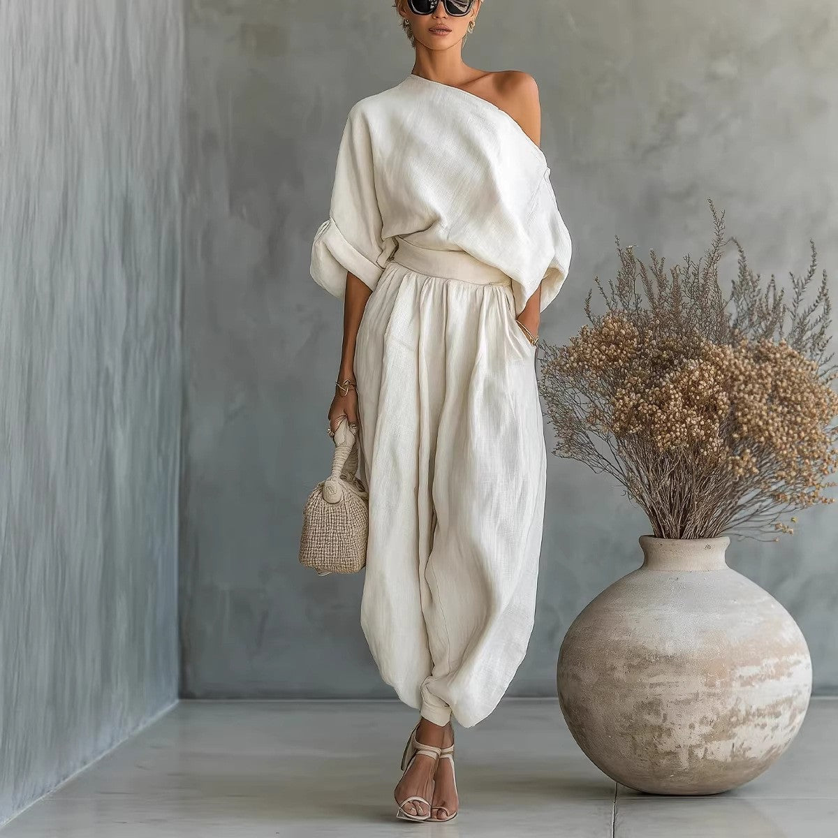 Ensfarvet elegant off-shoulder top og løse bukser todelt sæt til kvinder