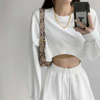 Kort sweater til kvinder med løs rund hals