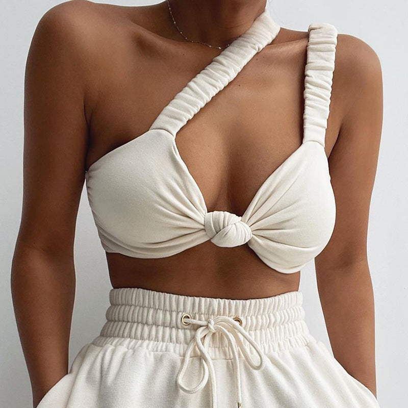 Ensfarvet patchwork crop top med snoet design og tynde stropper