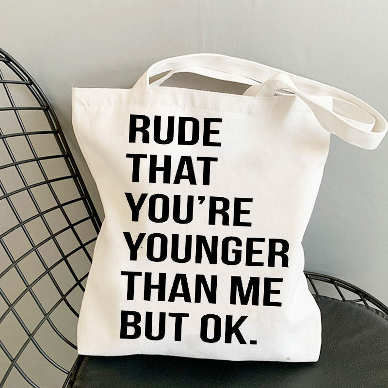 Trykt skuldertaske med foldet design